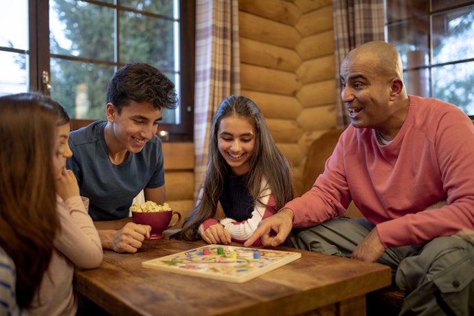 Decide Between Cooperative or Competitive Games