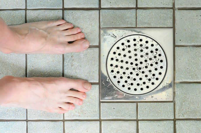 A Hose or Drainage Hole to Send the Water to a Floor-Level Drain