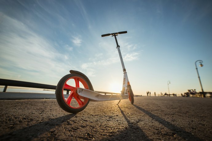 Folding Scooters and Kickstands for Convenience