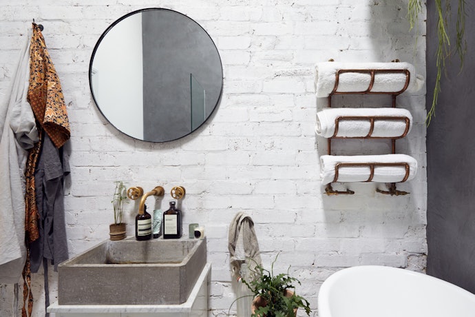 Get an Over-the-Door or Wall-Mounted Towel Rack to Save Space