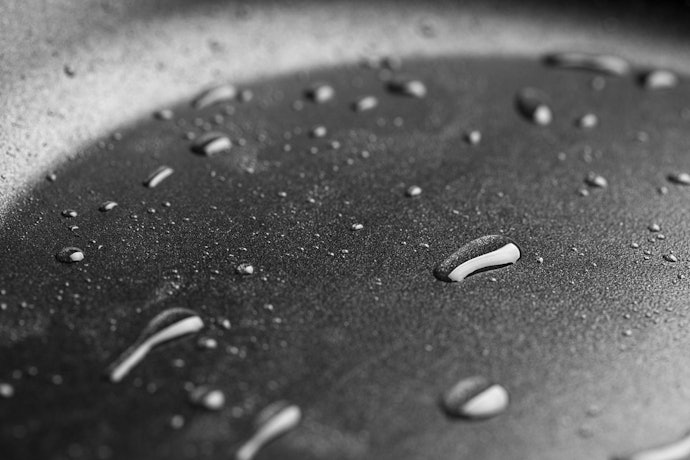Non-Stick or Teflon-Coated Woks for Easy Cleanup