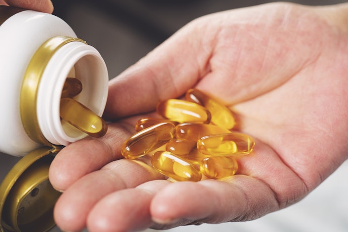 Check the Dosage: 1,000 - 2,000 IU per Day for Most Healthy Adults