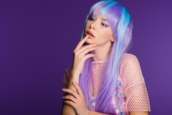 Look for Long or Below-Shoulder Wigs With Bangs to Achieve a Dramatic and Glamorous Appearance